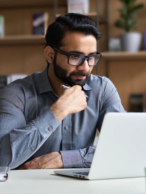 Man-Looking-At-Laptop-Screen