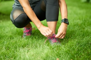 Two mature women keeping fit by  together